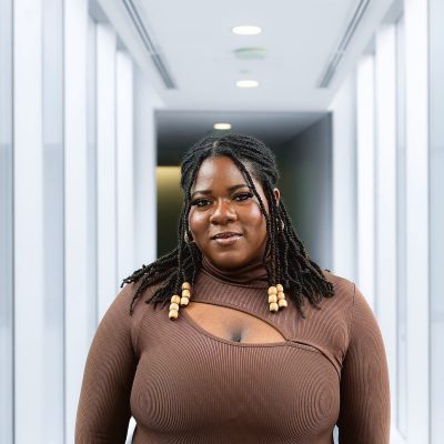 Izzy Akala headshot - October 2026
